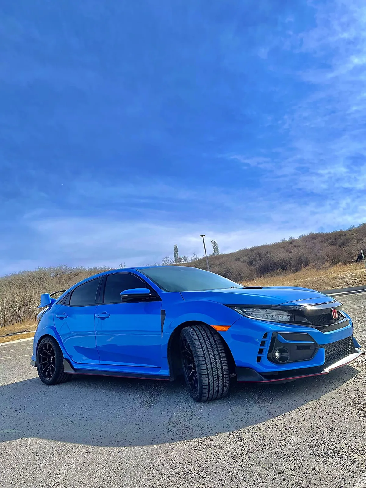 Blue Honda Civic Type R with visible Honda badge
